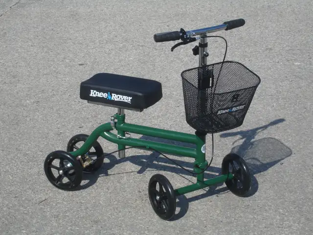 ALMOST BRAND NEW KNEE ROVER MOBILITY SCOOTER WITH CARRIER BASKET
