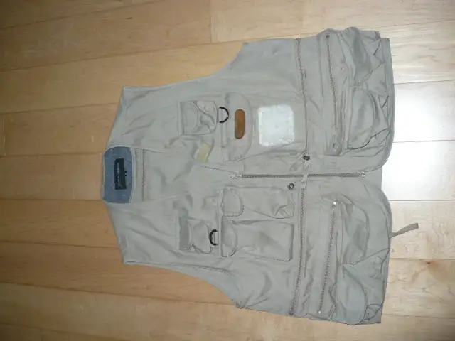 Veste de pecheur grandeur médium tres propre comme neuve