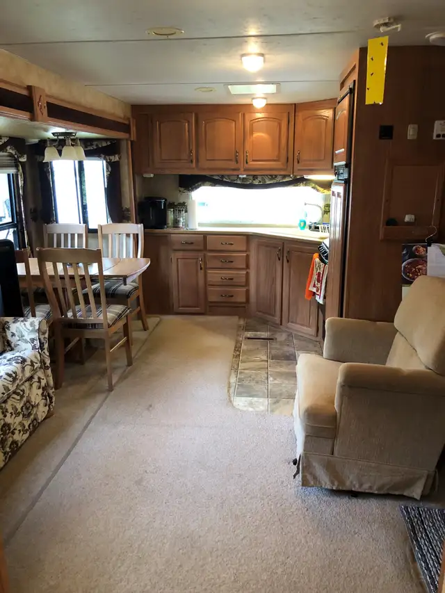 Trailer parked with deck and add room sleeps 9-Lake Erie 49K - Photo 5