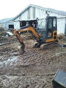 landscape stump removal exavator rental affordable rates