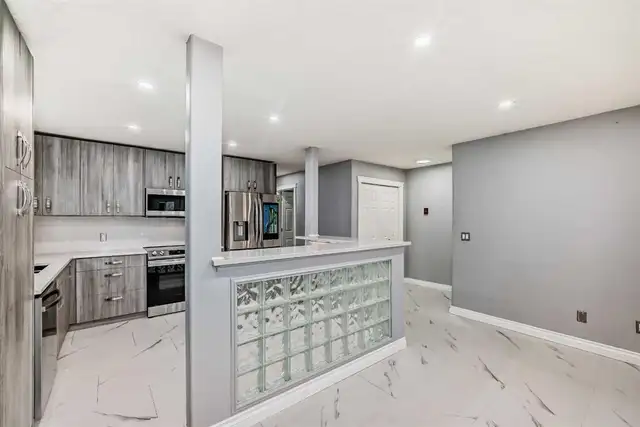 Own This Renovated 2BR Condo in Tuxedo with $0 Down - Photo 2