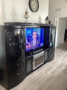 dufresne tv entertainment unit and fireplace