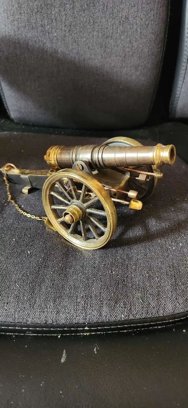 brass mechanical cannon