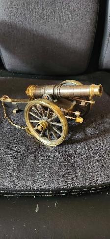 brass mechanical cannon