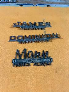 Vintage car dealership emblems