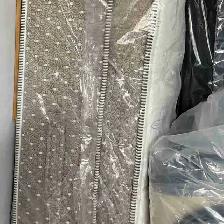 KING MATTRESS 14'POCKET COIL WITH FOAM ENCASEMENT FLOOR MODEL..