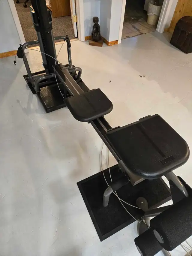 bowflex gym  with lat tower.