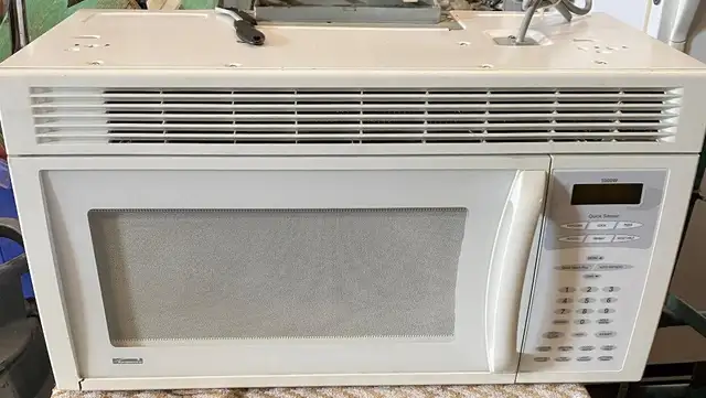 Kenmore microwave oven/hood exhaust fan.