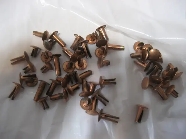 55 Copper colored split rivets