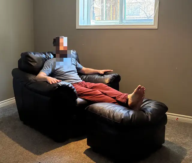 Brown leather chair and ottoman