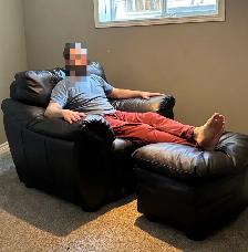 Brown leather chair and ottoman - Photo 2
