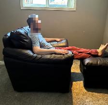 Brown leather chair and ottoman - Photo 3