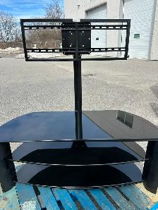 Black 3 layered glass tv stand.