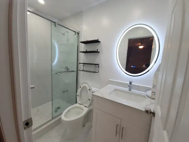 Spacious Bachelor Suite with Walk-Out to Backyard and Large Kitc - Photo 9