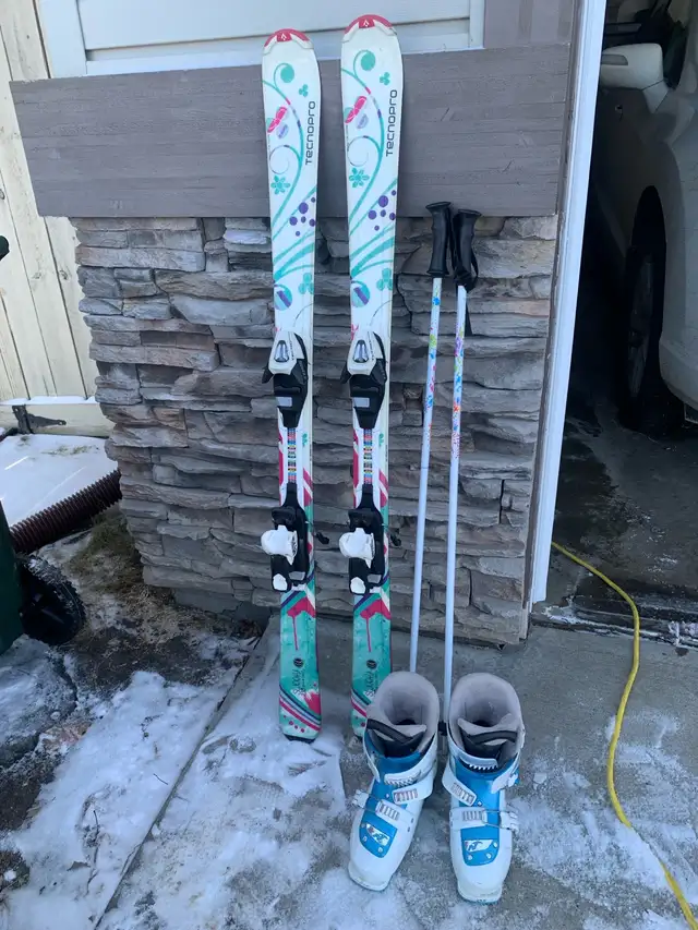 Skis Boots and Poles x 2 sets