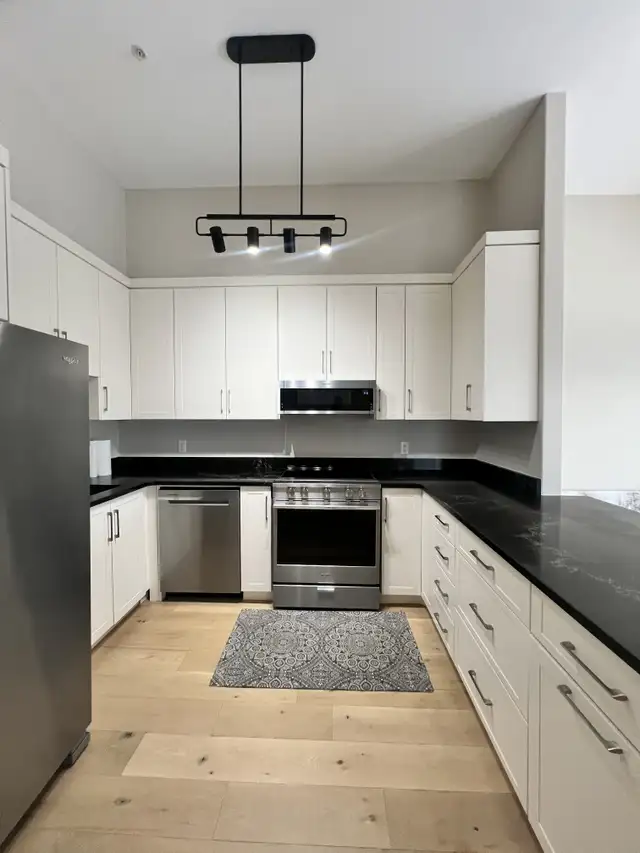 GORGEOUS, EXECUTIVE 2 BR 2 BATH CONDO AVAILABLE NOW! - Photo 5