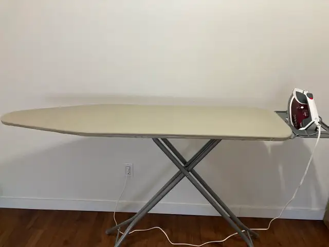 Almost new Mainstays 4 legs Iron Board with iron