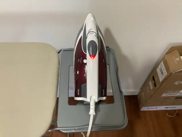 Almost new Mainstays 4 legs Iron Board with iron - Photo 2