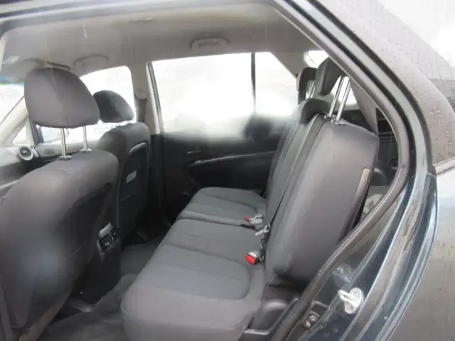 2011 Kia Rondo EX - Photo 11