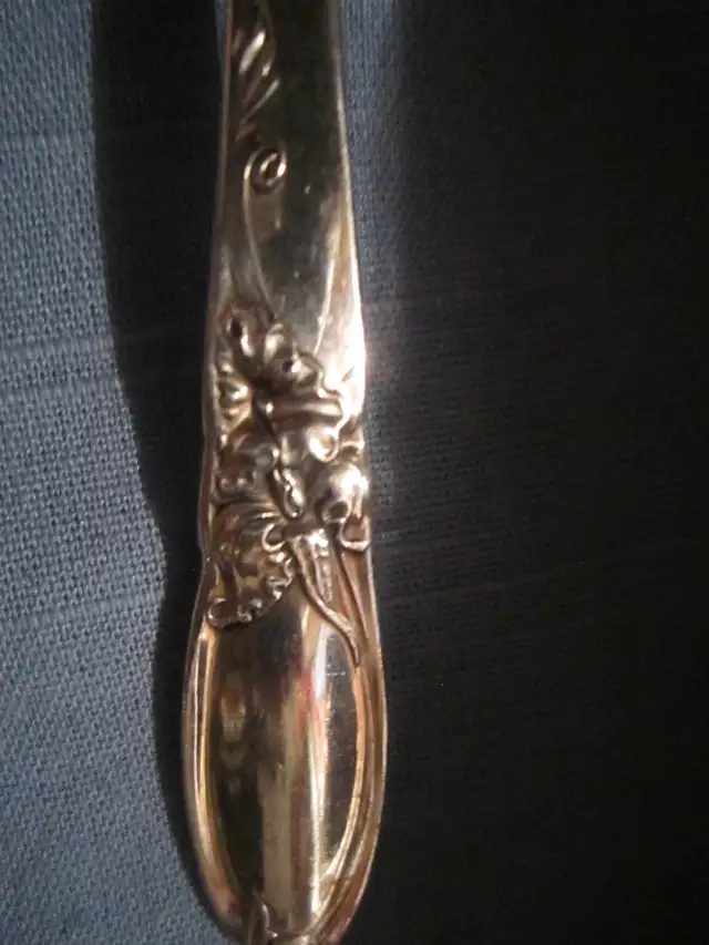 #130C  WHITE ORCHID silverware set for 8