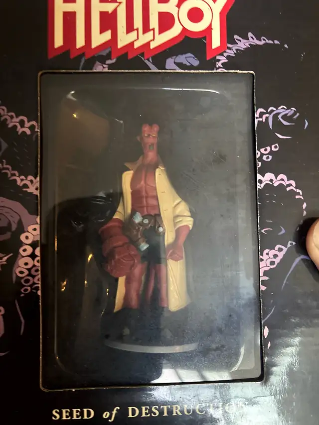 Selling Hellboy book and figure boxed set.