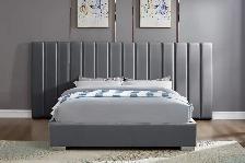 Platform  Bed With Paneled headboard In Grey Velvet.