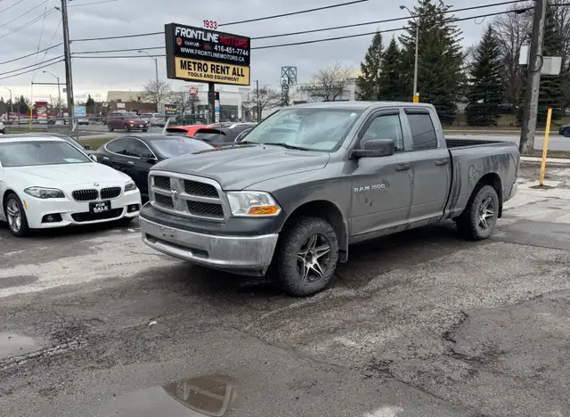 2012 Ram 1500 4WD Quad Cab 140.5' ST 4.7L V8