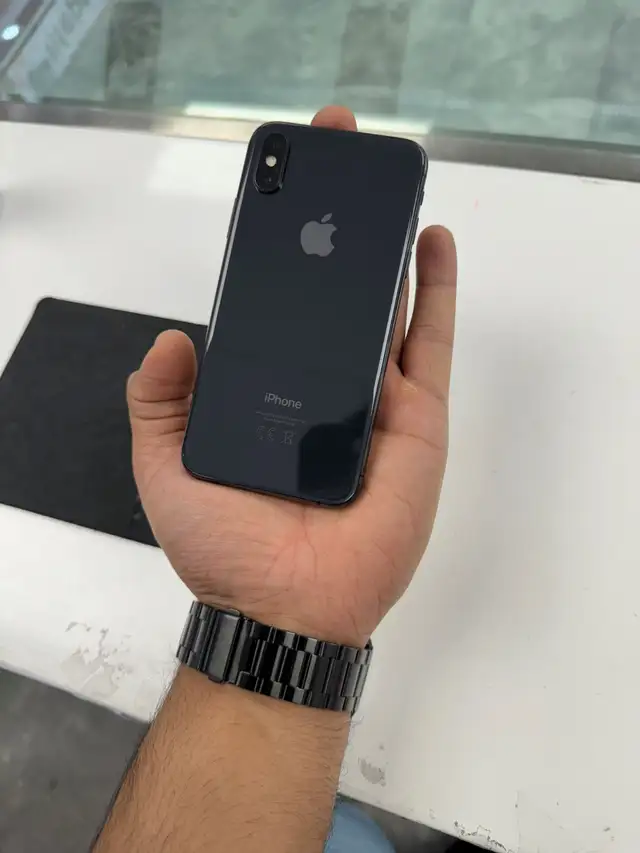 Unlocked Apple iPhone X with 1 year warranty
