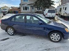 Honda civic 2003 standard manual transmission with four doors - Photo 2