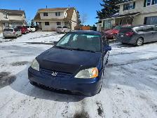 Honda civic 2003 standard manual transmission with four doors - Photo 3