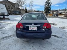 Honda civic 2003 standard manual transmission with four doors - Photo 4