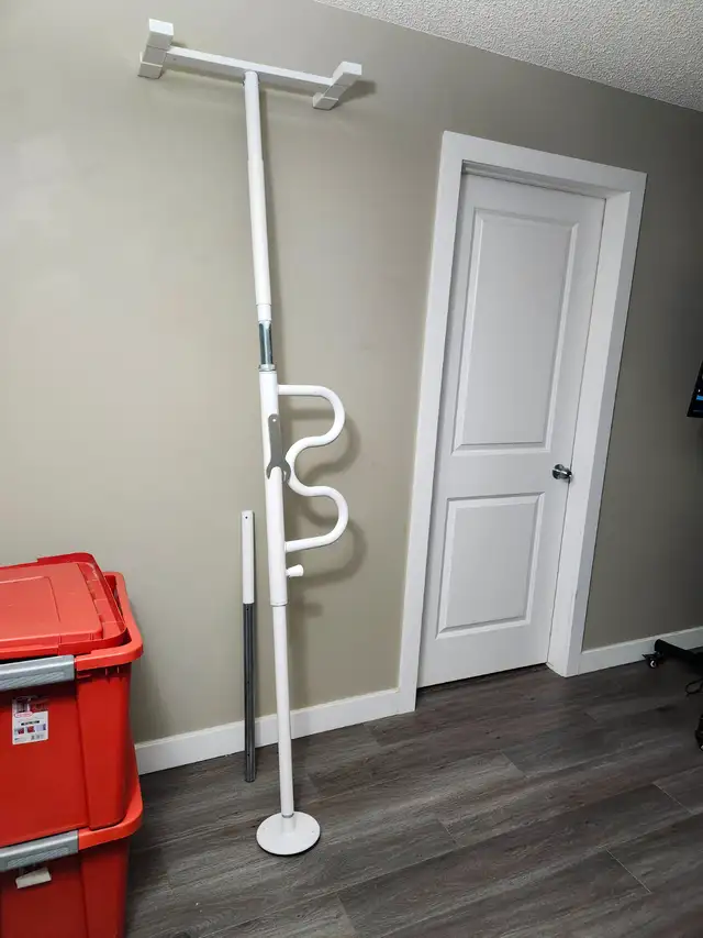 Adjustable wonder pole.$100