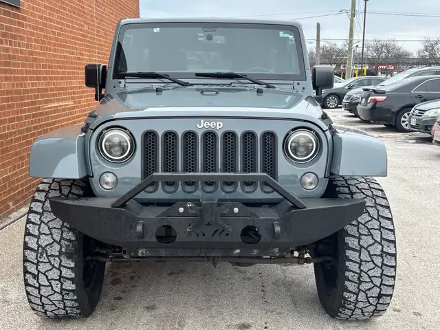 2015 Jeep WRANGLER UNLIMITED 4WD 4dr Sahara - Photo 2