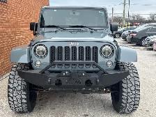 2015 Jeep WRANGLER UNLIMITED 4WD 4dr Sahara - Photo 2