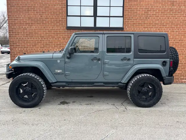 2015 Jeep WRANGLER UNLIMITED 4WD 4dr Sahara - Photo 4