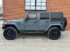 2015 Jeep WRANGLER UNLIMITED 4WD 4dr Sahara - Photo 4