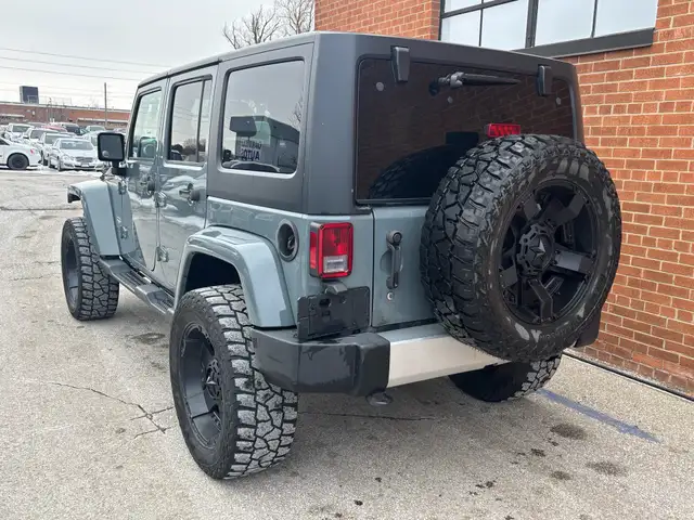2015 Jeep WRANGLER UNLIMITED 4WD 4dr Sahara - Photo 5