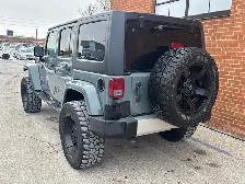 2015 Jeep WRANGLER UNLIMITED 4WD 4dr Sahara - Photo 5