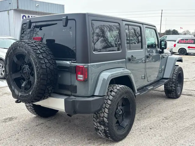 2015 Jeep WRANGLER UNLIMITED 4WD 4dr Sahara - Photo 7