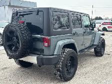 2015 Jeep WRANGLER UNLIMITED 4WD 4dr Sahara - Photo 7