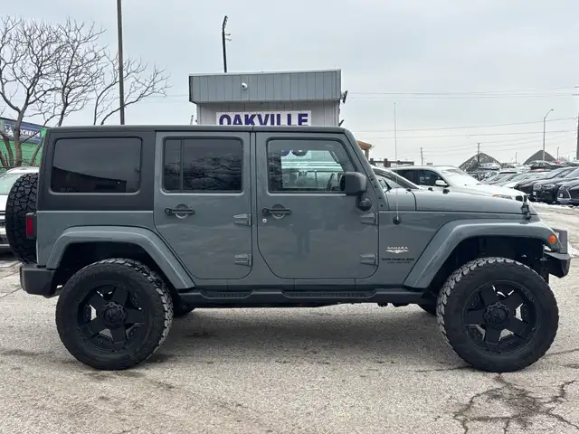 2015 Jeep WRANGLER UNLIMITED 4WD 4dr Sahara - Photo 8