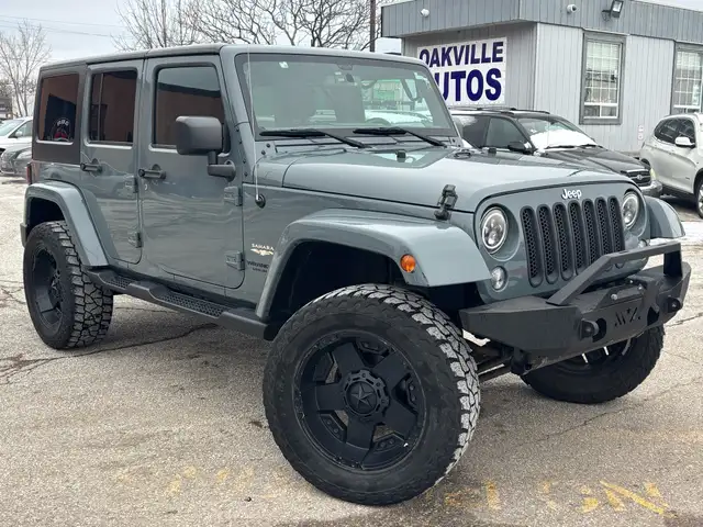 2015 Jeep WRANGLER UNLIMITED 4WD 4dr Sahara - Photo 9