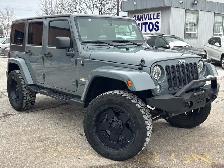 2015 Jeep WRANGLER UNLIMITED 4WD 4dr Sahara - Photo 9