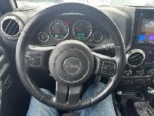 2015 Jeep WRANGLER UNLIMITED 4WD 4dr Sahara - Photo 12