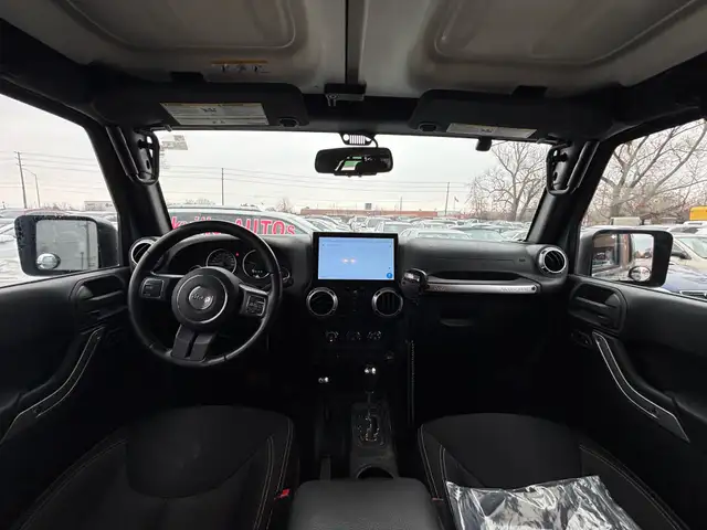 2015 Jeep WRANGLER UNLIMITED 4WD 4dr Sahara - Photo 21