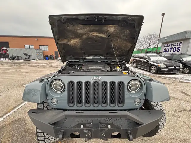 2015 Jeep WRANGLER UNLIMITED 4WD 4dr Sahara - Photo 24