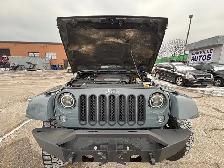 2015 Jeep WRANGLER UNLIMITED 4WD 4dr Sahara - Photo 24