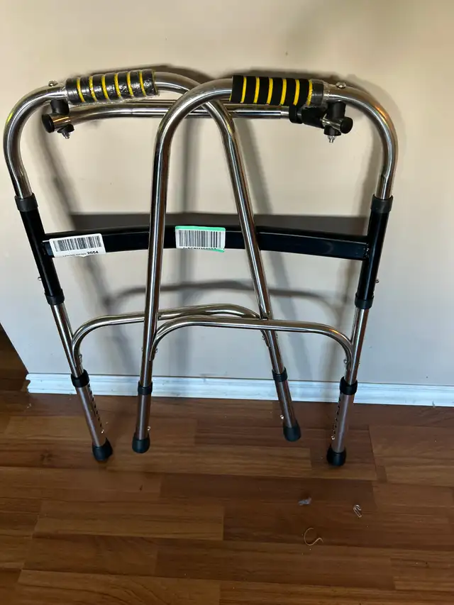 TWO NEW 'NEVER USED' FOLDUP WALKERS FOR SALE