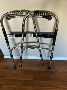 TWO NEW 'NEVER USED' FOLDUP WALKERS FOR SALE