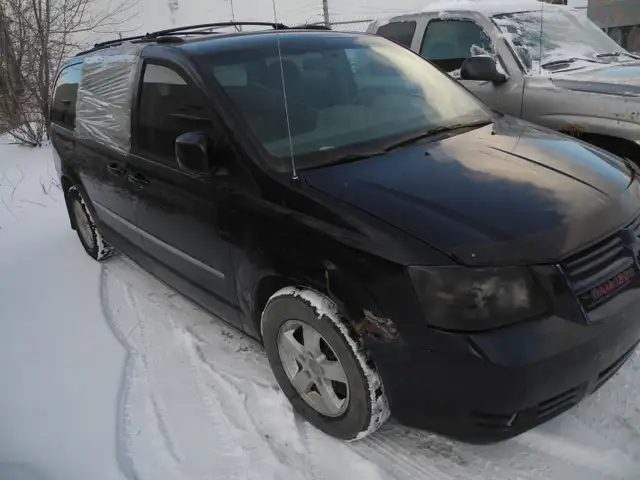 2010 Dodge Grand Carvan has Engine  Noise - Photo 4